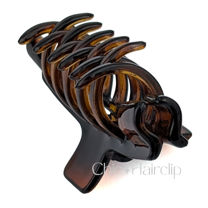 Pince cheveux originale Fabriquée en France, couleur écaille. Matière plastique de qualité.